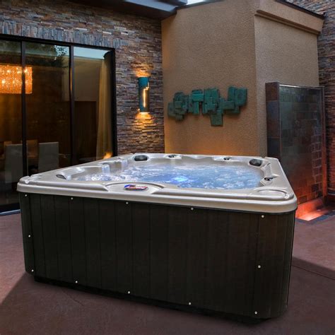 - 7 people is a squeeze. Dimensions: 81 x 81 x 34 inches Person Capacity: 7 people Water Capacity: 300 gal Jets: 65. This is a great option for big gatherings, a huge hot tub with 65 jets and a seven person capacity. It has hundreds of five-star reviews from other users, built-in LEDs, and a dedicated turbo-blaster …